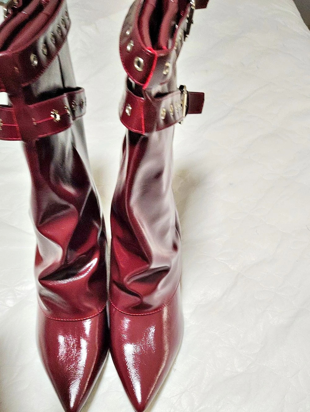 Studded Pointed-Toe Heeled Boots in Red